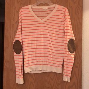Striped long-sleeved shirt with elbow pads.